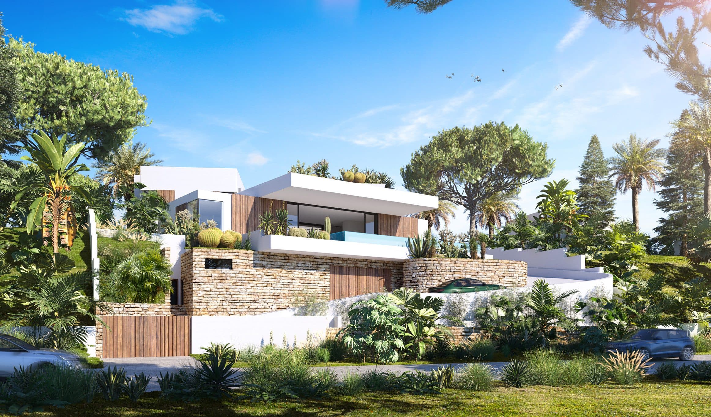 La villa dans son paysage de pins et de bougainvilliers